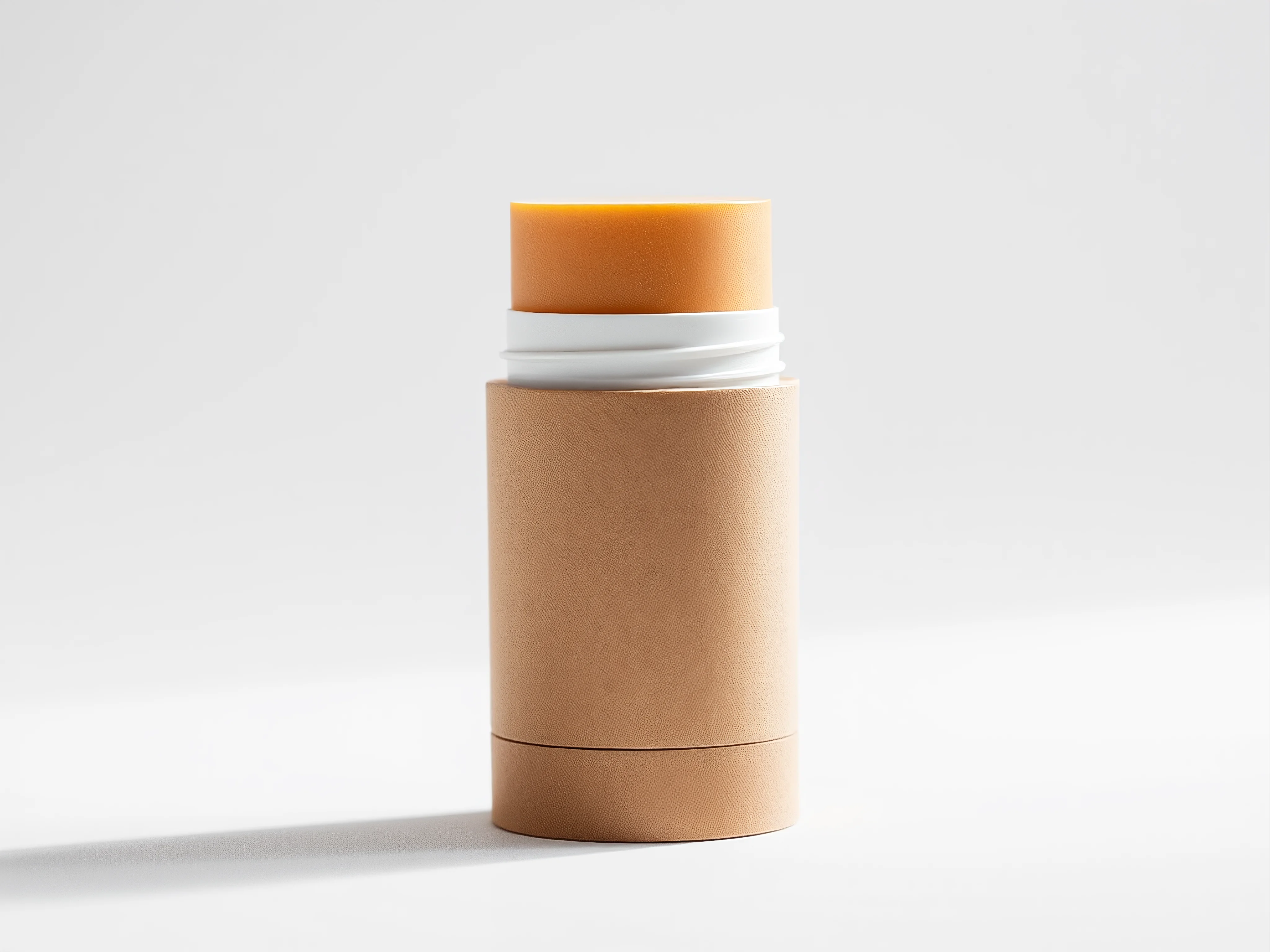 Eco-friendly antiperspirant stick in recycled cardboard packaging on a white background.